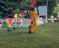 King Charles Arrives In The Bahamas As Reparations Protesters Demand Apology