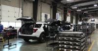 Inside the Tumwater facility building Washington State Patrol cars