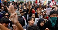 Indonesians protest against graft, wildfires, economic hardship