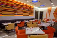 Nigeria’s fast-food sector swaps western menus for local rice and apps