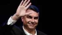 Brazil's Flavio Bolsonaro flies on from Ecuador to mystery destination despite travel ban