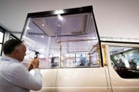 A throne on wheels, popemobiles star in new Vatican show