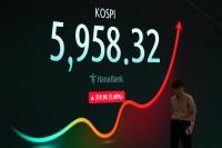 AP News: The bond market swings, but US stocks remain steady after the Fed says it won't raise interest rates