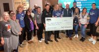 Dahl Automotive presents $20,000 check to La Crosse Area Family YMCA