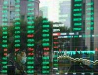 China stocks slip as tech weakness overshadows Fed rate decision