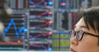 Asian shares and U.S. futures are mixed after Google parent Alphabet's earnings disappoint