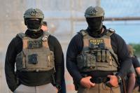 DOJ Says It Won't Deploy FBI, ICE Agents as Poll Monitors