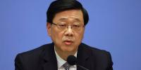 Hong Kong leader apologizes for fire that killed 168 as housing secretary resigns