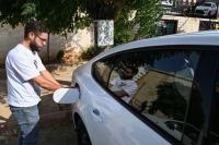 Dodging fuel price hikes, Damascus drivers turn to electric cars