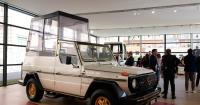 A popemobile exhibition at the Vatican features the vehicle popes have used since 1930