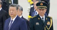 China vows continued anti-corruption campaign, OKs removal of key figures