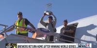 Brewers return to Milwaukee as World Series champs