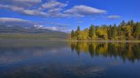 Montana's Captivating Gem In The Rockies Is This Serene Mountain Lake To Water-Ski, Fish, And Camp