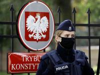 Poland’s President cuts short Senegal visit as police cordon off top court after chief’s suspension in clash with PM Tusk