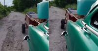 Family in Mayabeque transports their grandfather's coffin in a cart pulled by a car after waiting for hours for a hearse
