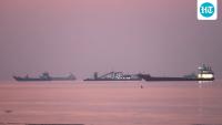 Iran says multiple oil tankers strike mines, catch fire in Strait of Hormuz