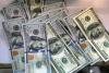 Peso drops to historic low anew, closes at 61.75 per US dollar